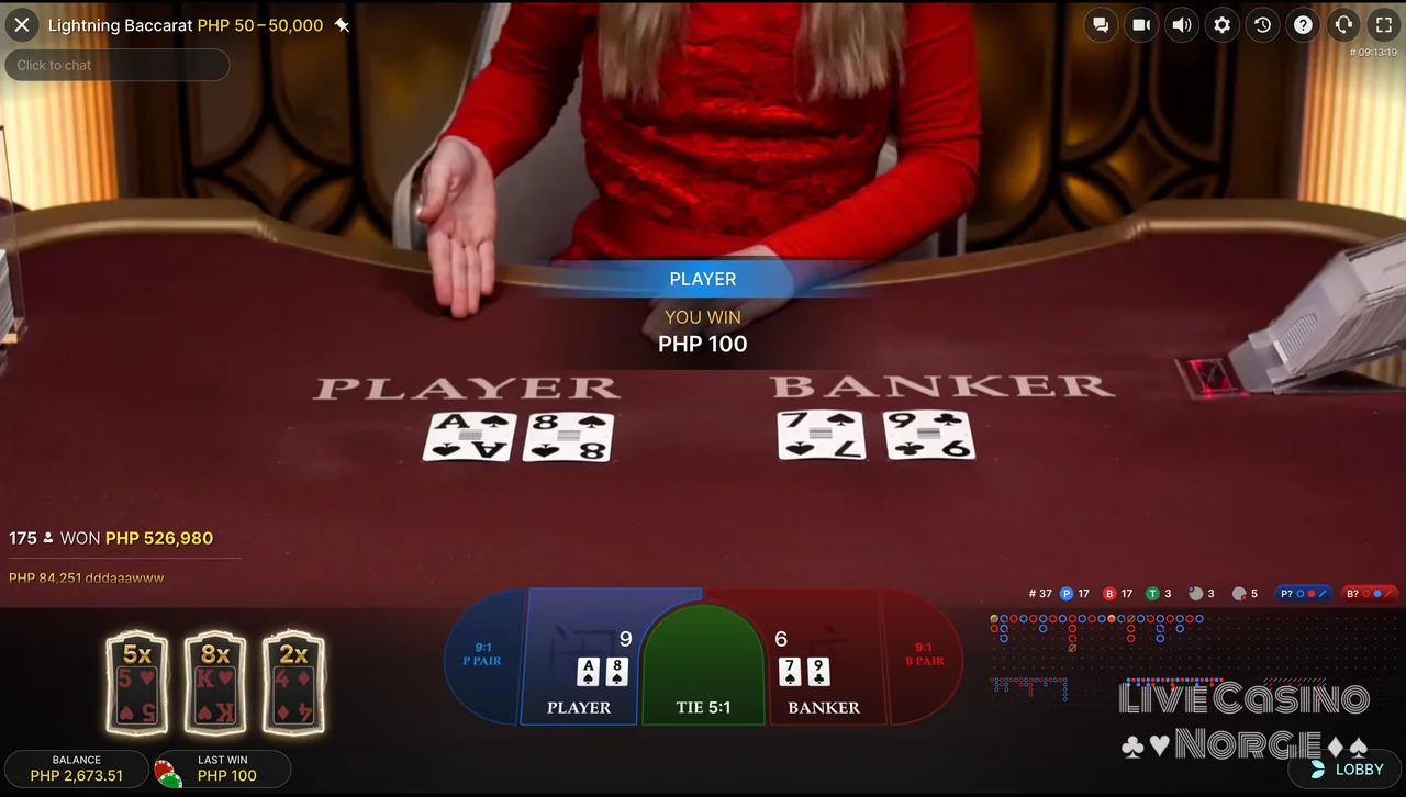 Lightning Baccarat - Vinnerhånd og multiplikatorresultat vises etter runden.